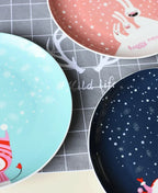 Coleção de Pratos Natalinos: Porcelana Ilustrada com Cenas de Inverno